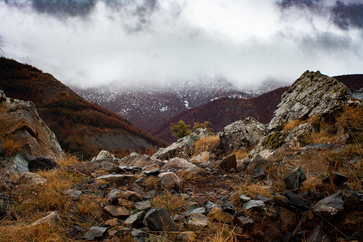 Scenic view of rocky mountains against sky