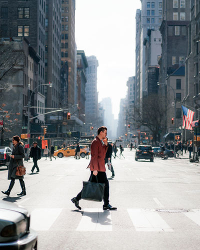 Full length of a man in city