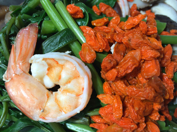 Close-up of wolfberries and prawn