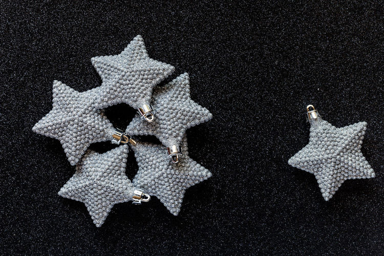 High angle view of star shape christmas ornaments on table