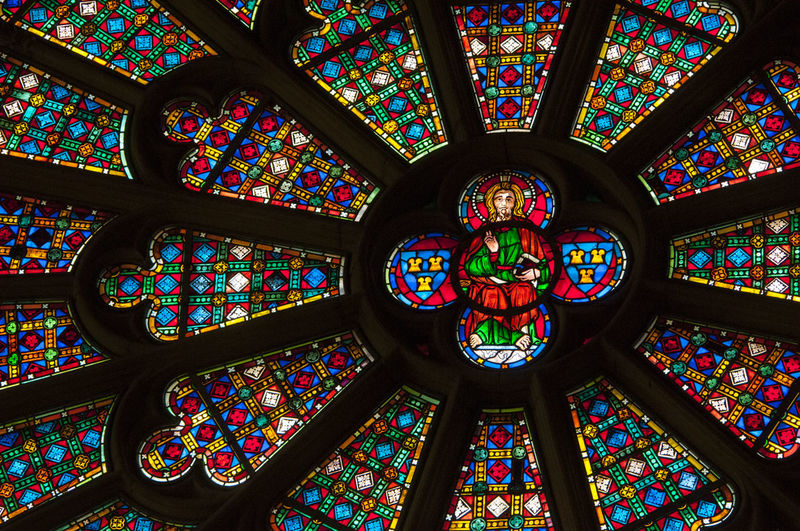 Low angle view of stained glass window in temple