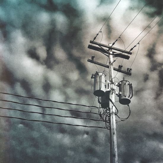 Low angle view of telephone pole
