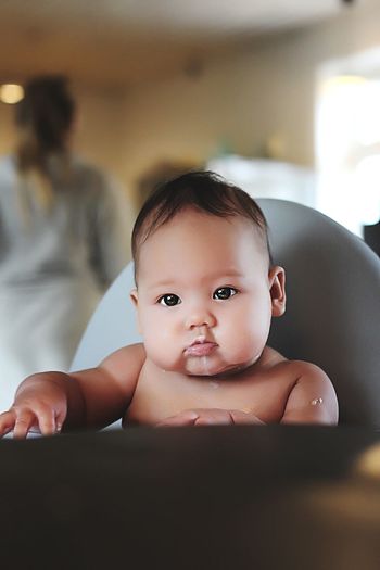 Portrait of cute baby at home