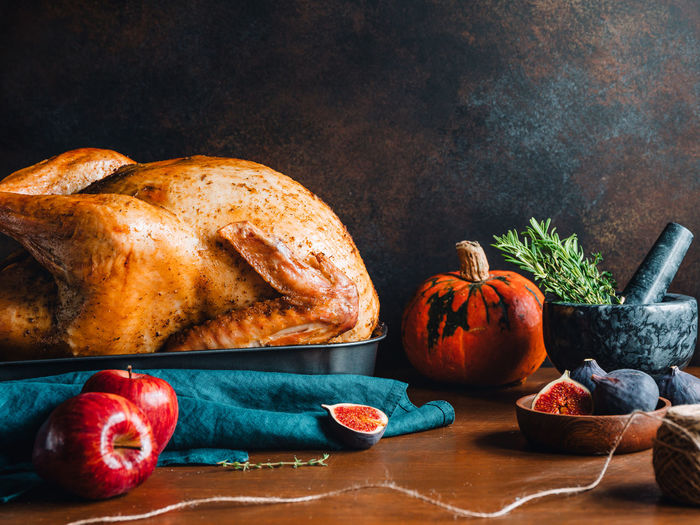 Close-up of roast turkey on table