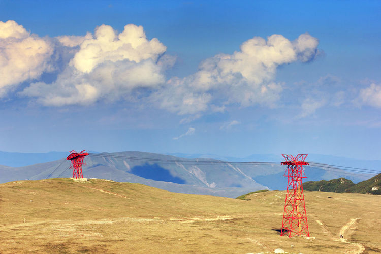 Electricity pylon on mountain at bucegi natural park