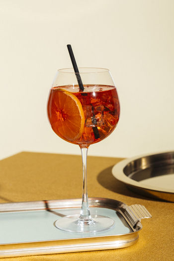 Close-up of drink in wineglass on table