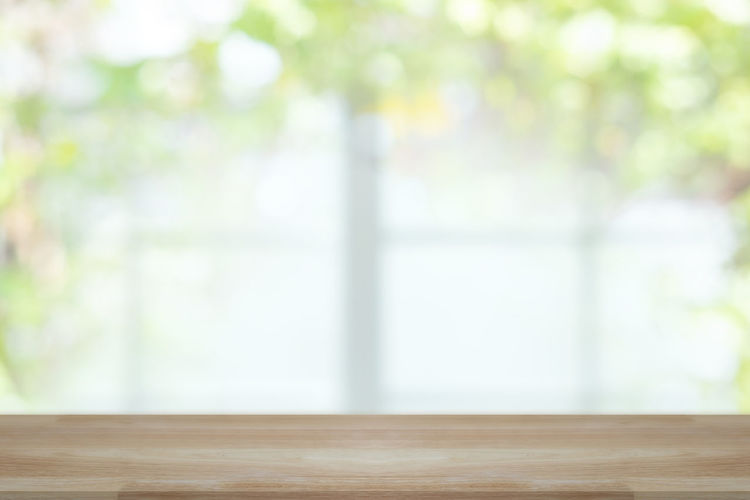 Close-up of window on wooden table