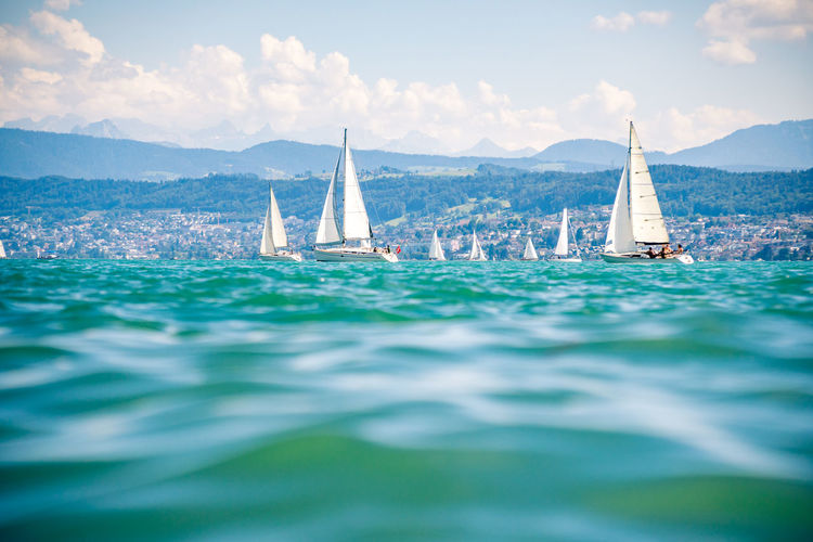 Sailboats on beautiful lake zürich zürichsee in switzerland.