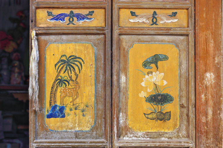 0919 wooden door with ashtamangala-buddhist auspicious symbols-qianfo-mati si temple. zhangye-china.