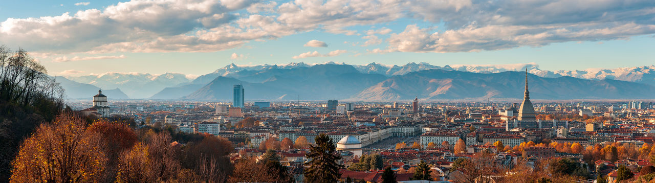 Autumn panorama of the city of turin torino piedmont, italy with the surrounding alps mountains