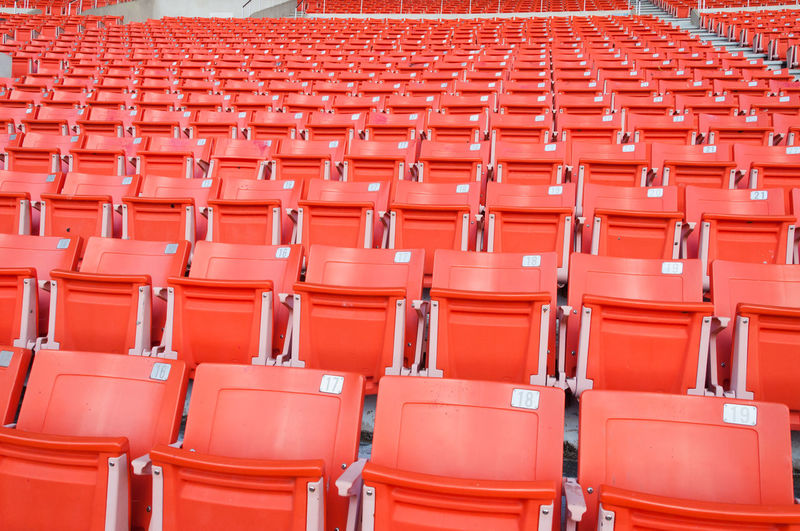 Full frame shot of empty red chairs