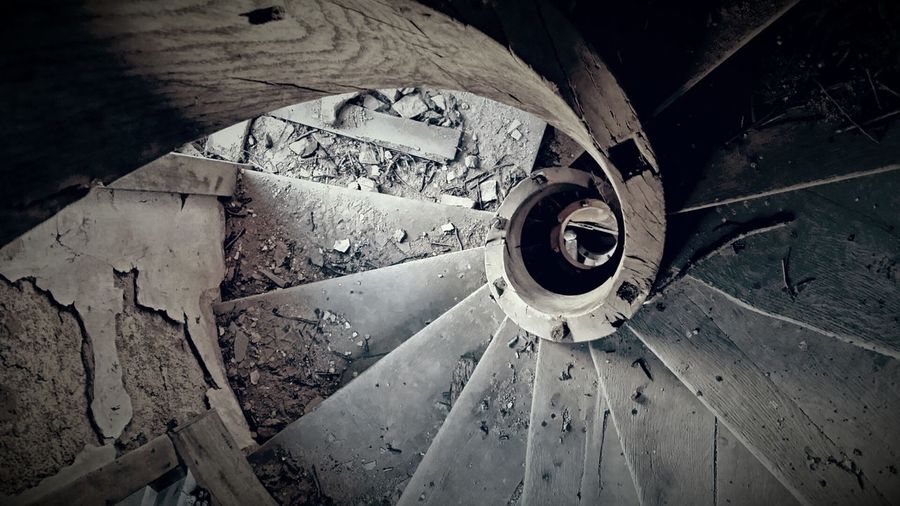 High angle view of spiral abandoned stairs