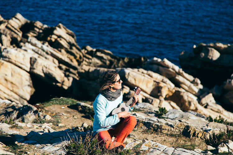 Full length of woman on sea shore