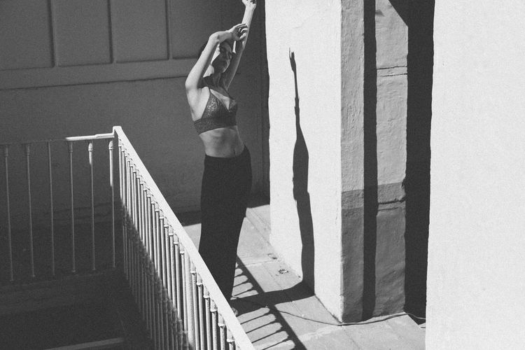 Shadow of woman on stairs