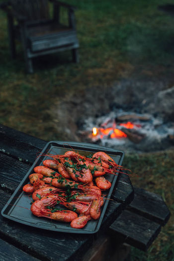 Spot prawns shrimp seafood in butter garlic parsley camping outdoors