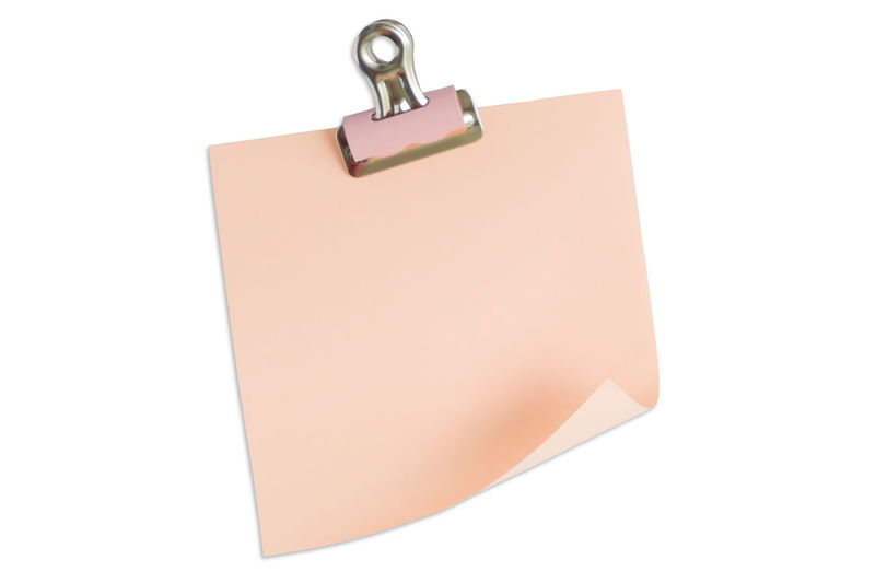 Close-up of empty paper against white background