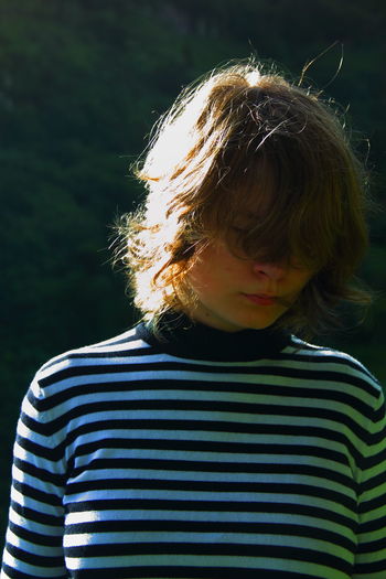 Close-up of woman with messy hair