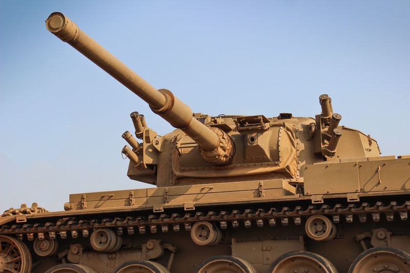Low angle view of armored tank against clear sky