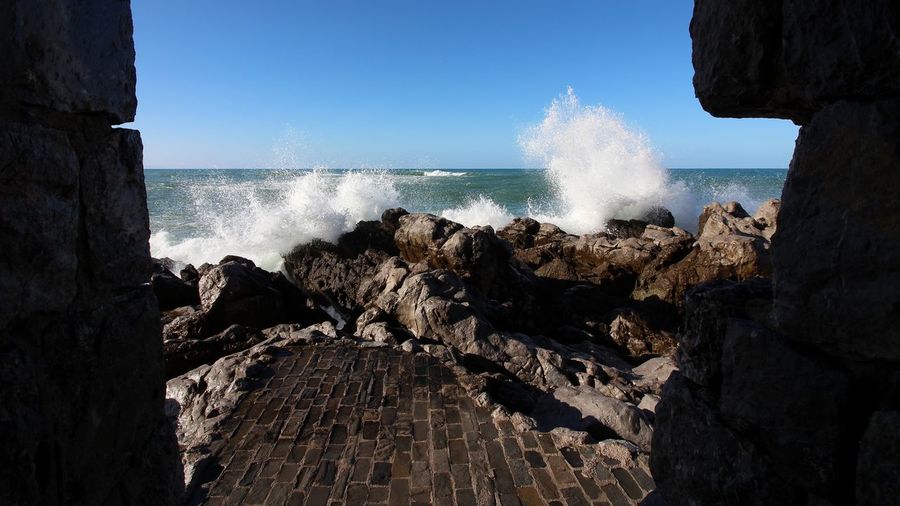Panoramic view of sea against clear sky