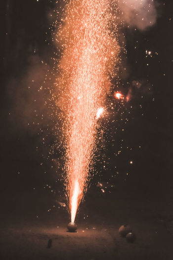 Fireworks display at night in city street during diwali festival celebration in kolkata india. 