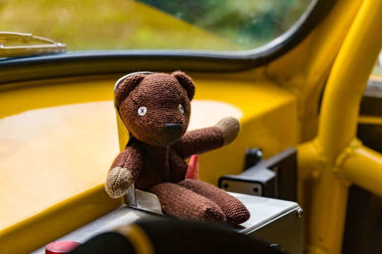 Close-up of teddy bear in car