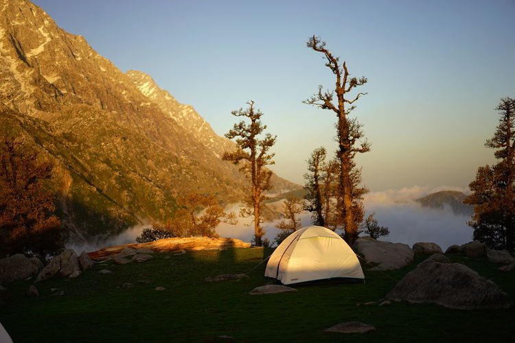 Tent on mountain against sky