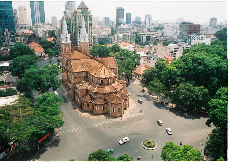 High angle view of saigon notre-dame basilica by road in city