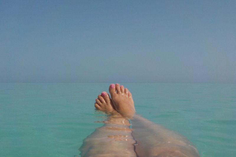 Woman relaxing in sea