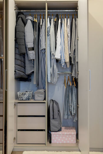 Clothes hanging on rack at home