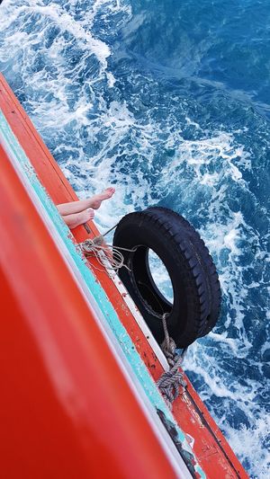 High angle view of woman in ship on sea