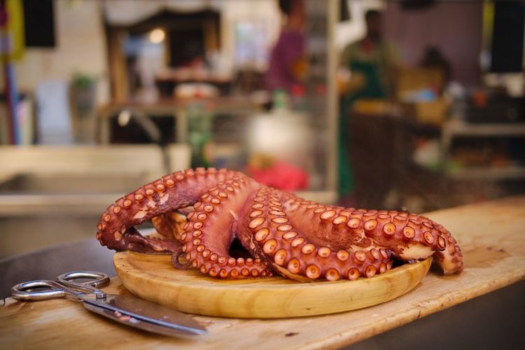 Close-up of octopus in plate on table