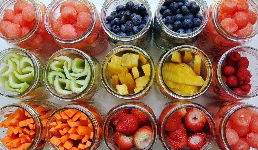 Close-up of fruits in jars
