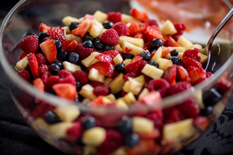 Fruit salad in bowl on table