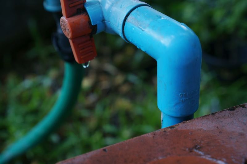 Close-up of water dripping from pipe