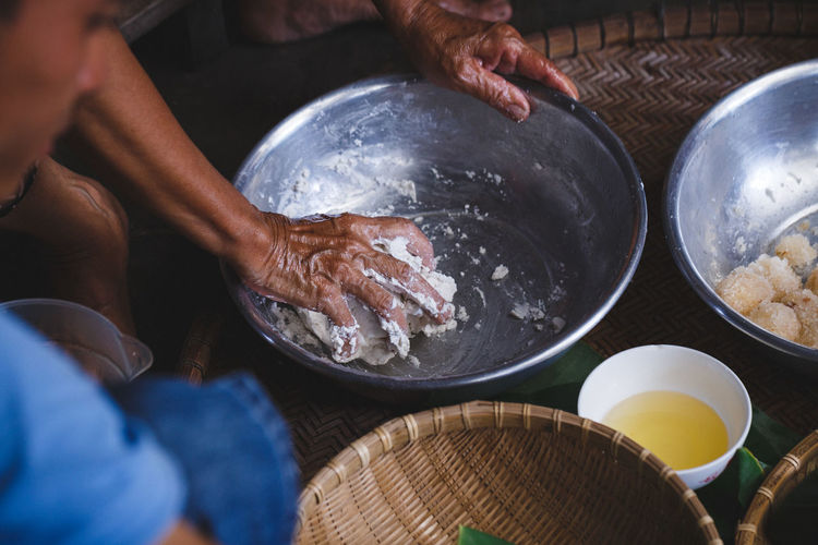 Cropped image of man preparing sweet food