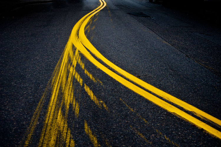 High angle view of yellow zebra crossing on road