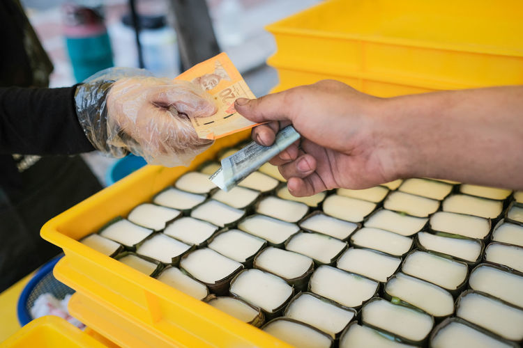High angle view of man working in tray