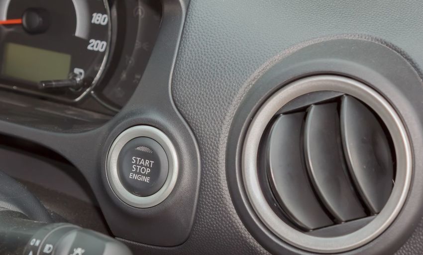 Close-up of button in car
