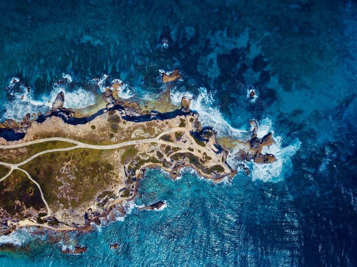 Top view of island in caribbean ocean.