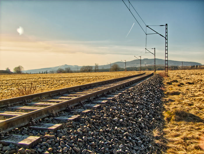 Railroad tracks against clear sky