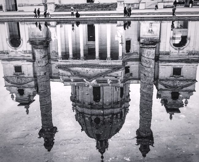 Reflection of basilica in water