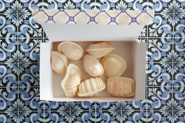 Top view of box with traditional portuguese sweet called ovos moles de aveiro