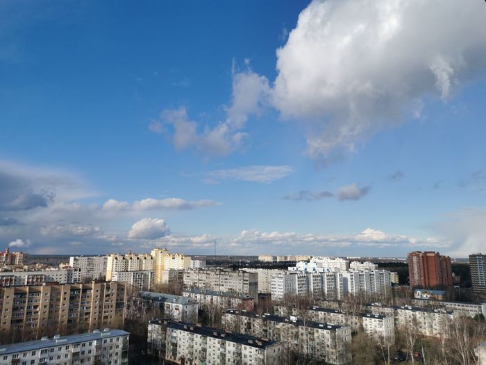 High angle view of buildings against sky