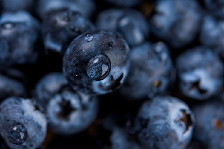 Fresh ripe blueberries with drops of dew. berry background. macro photo