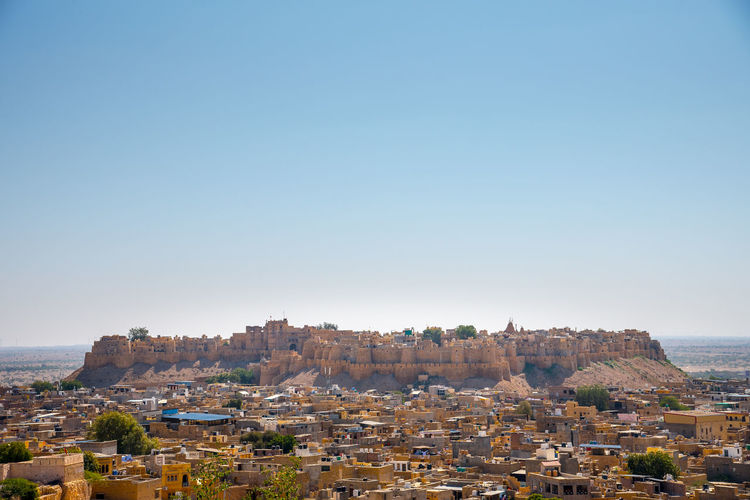 Jaisalmer townscape against clear blue sky