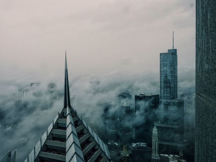 View of skyscrapers in foggy weather