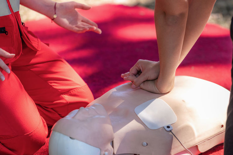 Cpr medical training, reanimation procedure on cpr doll