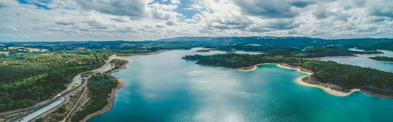 Panoramic view of bay with a cloudy sky in the background