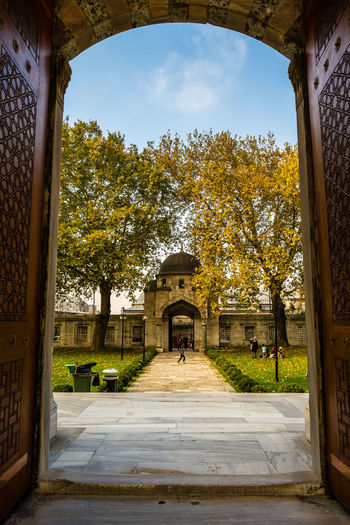 Walkway seen through arch door