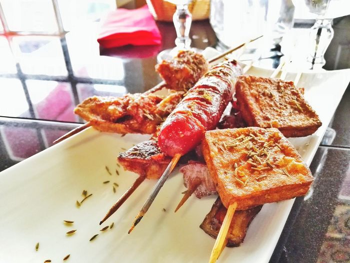High angle view of yakitori in plate on table